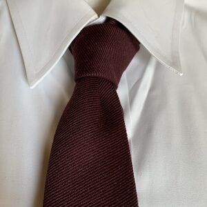 NWT “Black Fleece” dark maroon 100% wool narrow tie.